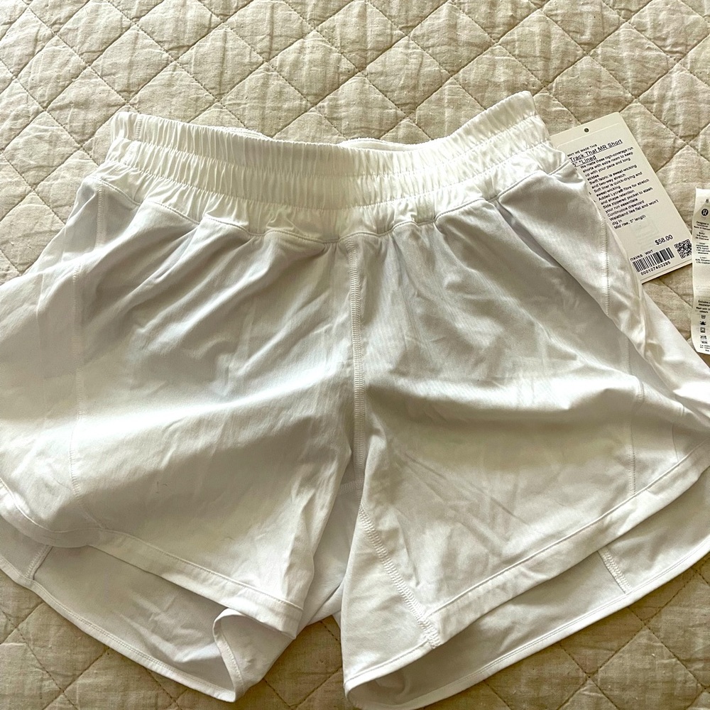 Brand new Lululemon white shorts sz 8 with tags